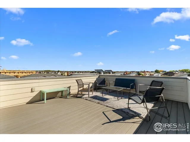 a view of a terrace with chairs