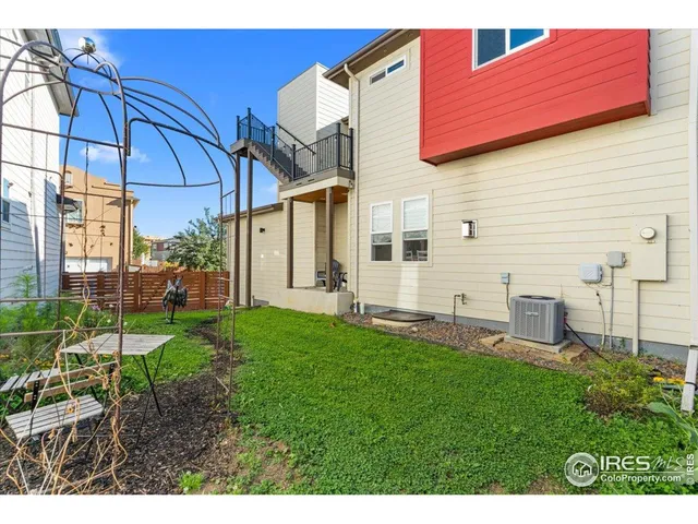 a view of a backyard with plants