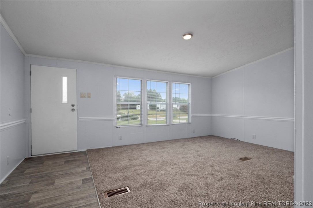 67 Apache Drive Parkton, NC 28371 - Photo 2 of 18 a view of an empty room with a window