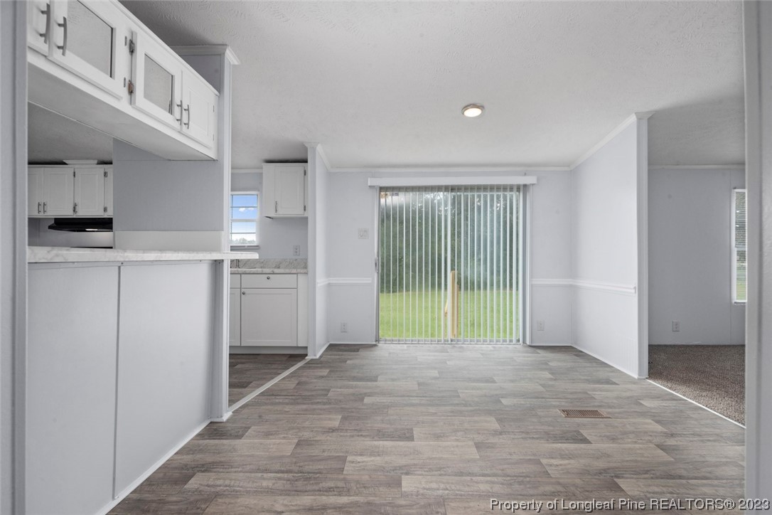 67 Apache Drive Parkton, NC 28371 - Photo 4 of 18 a view of a kitchen with refrigerator and a sink