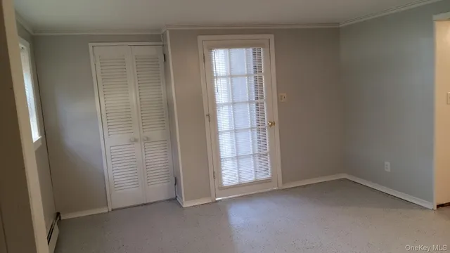 an empty room with windows
