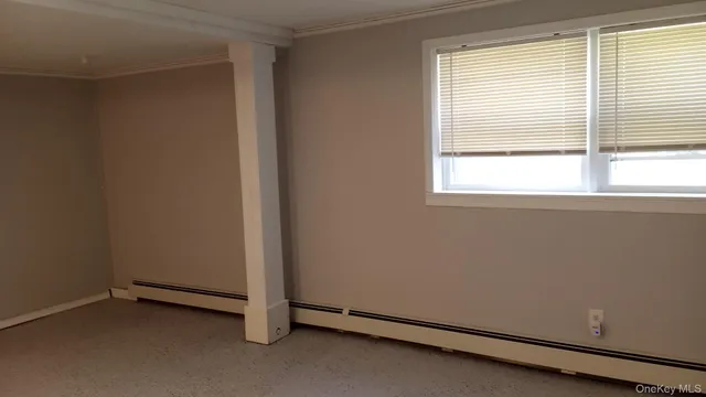 an empty room with a window