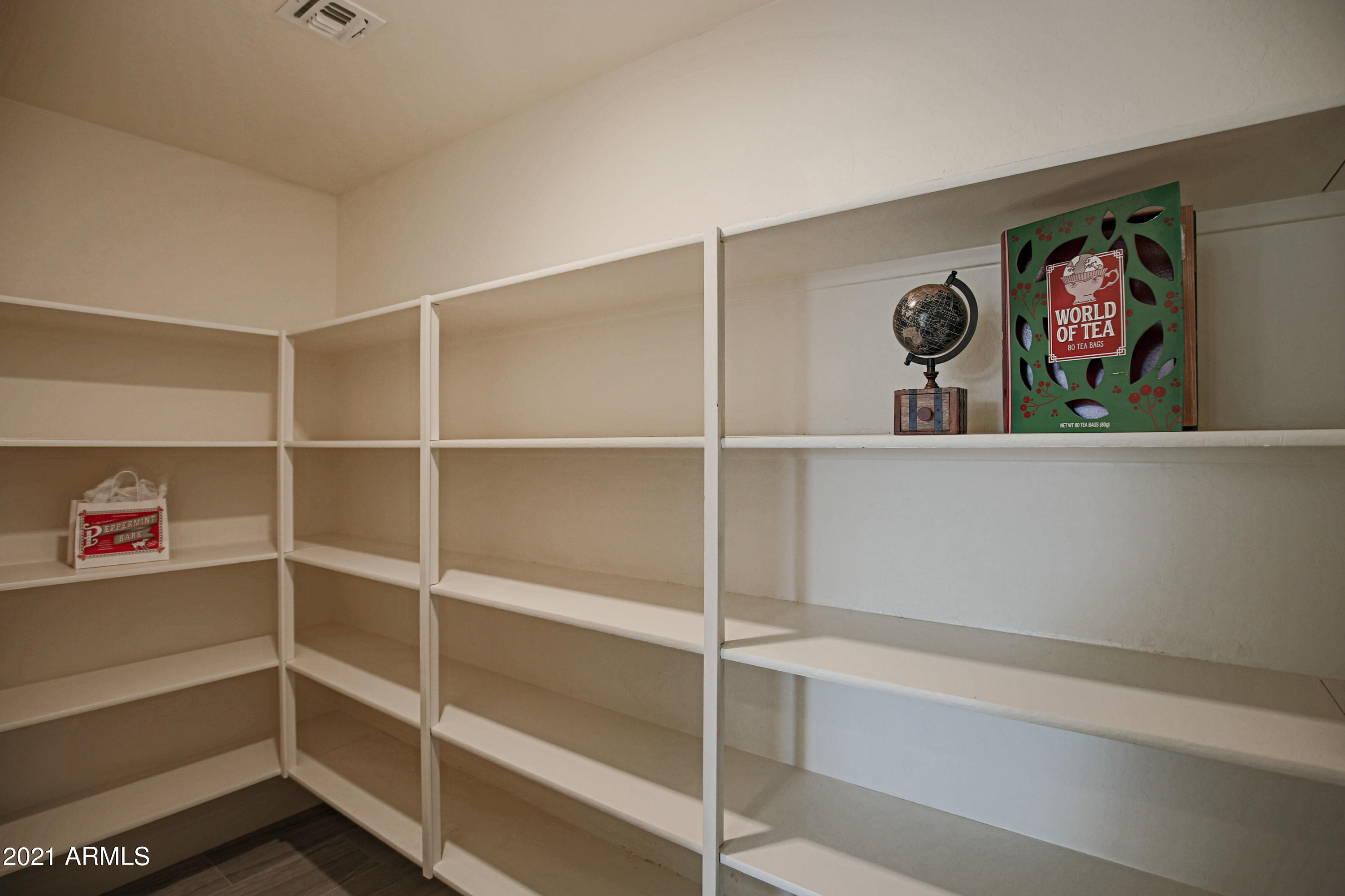 18325 West Raven Road Goodyear, AZ 85338 - Photo 12 of 59 Walk in Pantry!