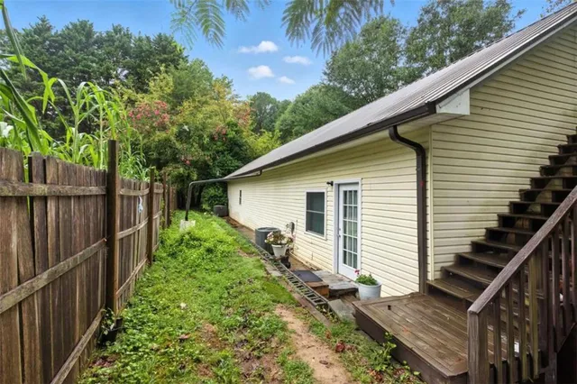 a view of backyard with green space