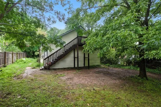 a view of backyard with green space