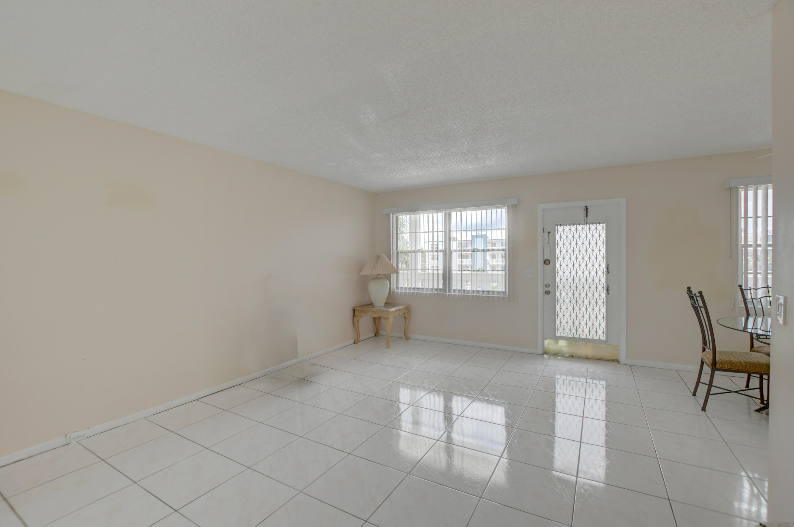 3060 Exeter Boca Raton, FL 33434 - Photo 4 of 49 a view of an empty room with a window