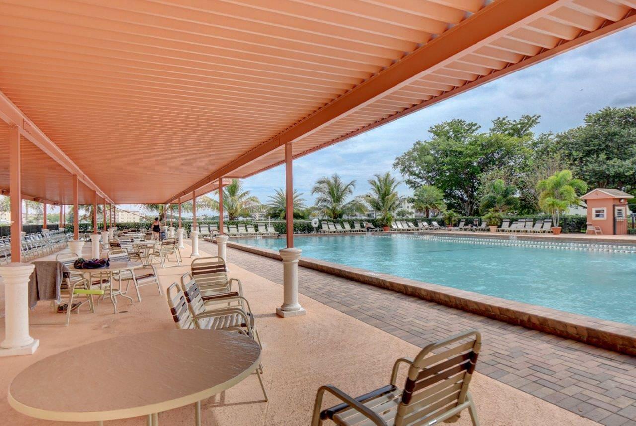 3060 Exeter Boca Raton, FL 33434 - Photo 42 of 49 swimming pool view with a outdoor seating