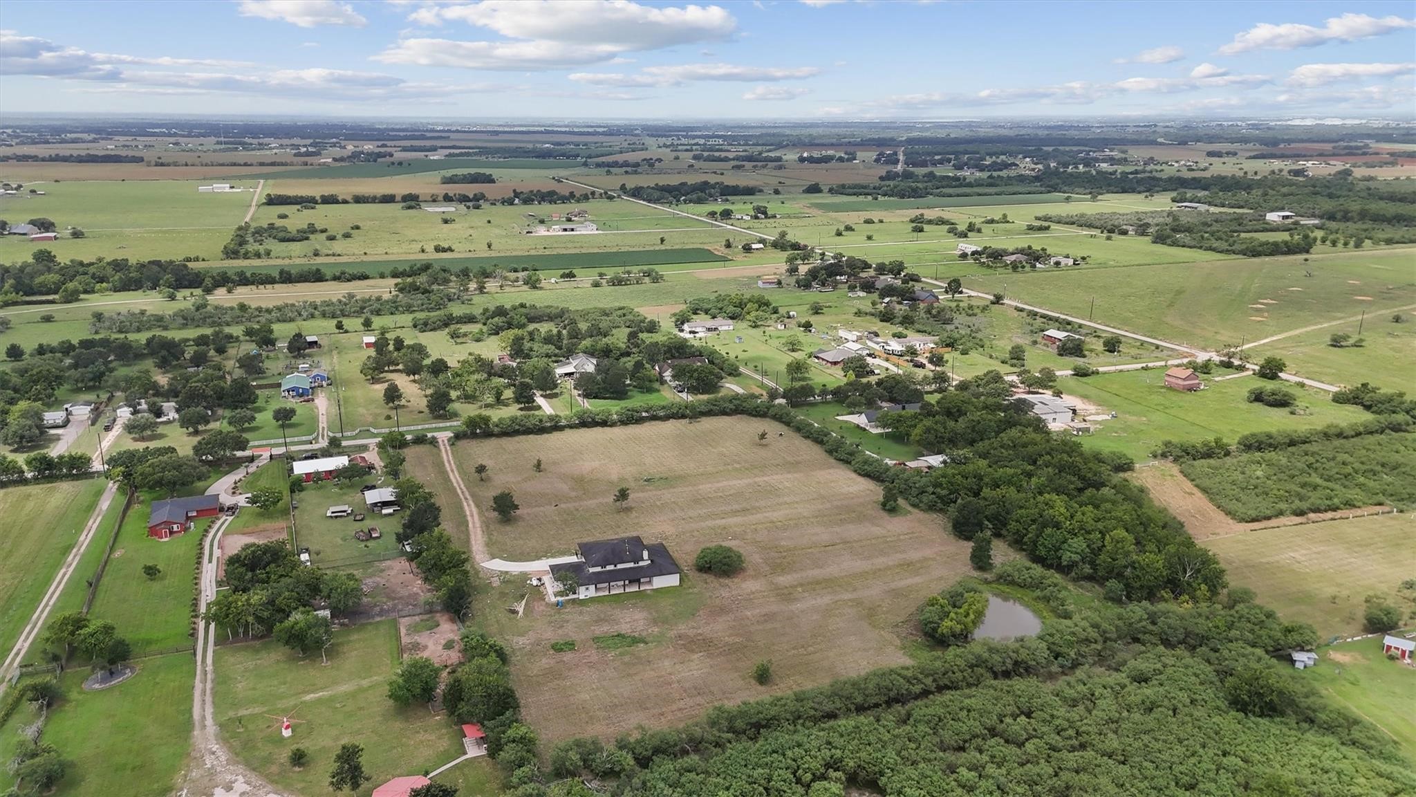 1900 Lezak Road Sealy, TX 77474 - Photo 26 of 34 an aerial view of a houses with outdoor space