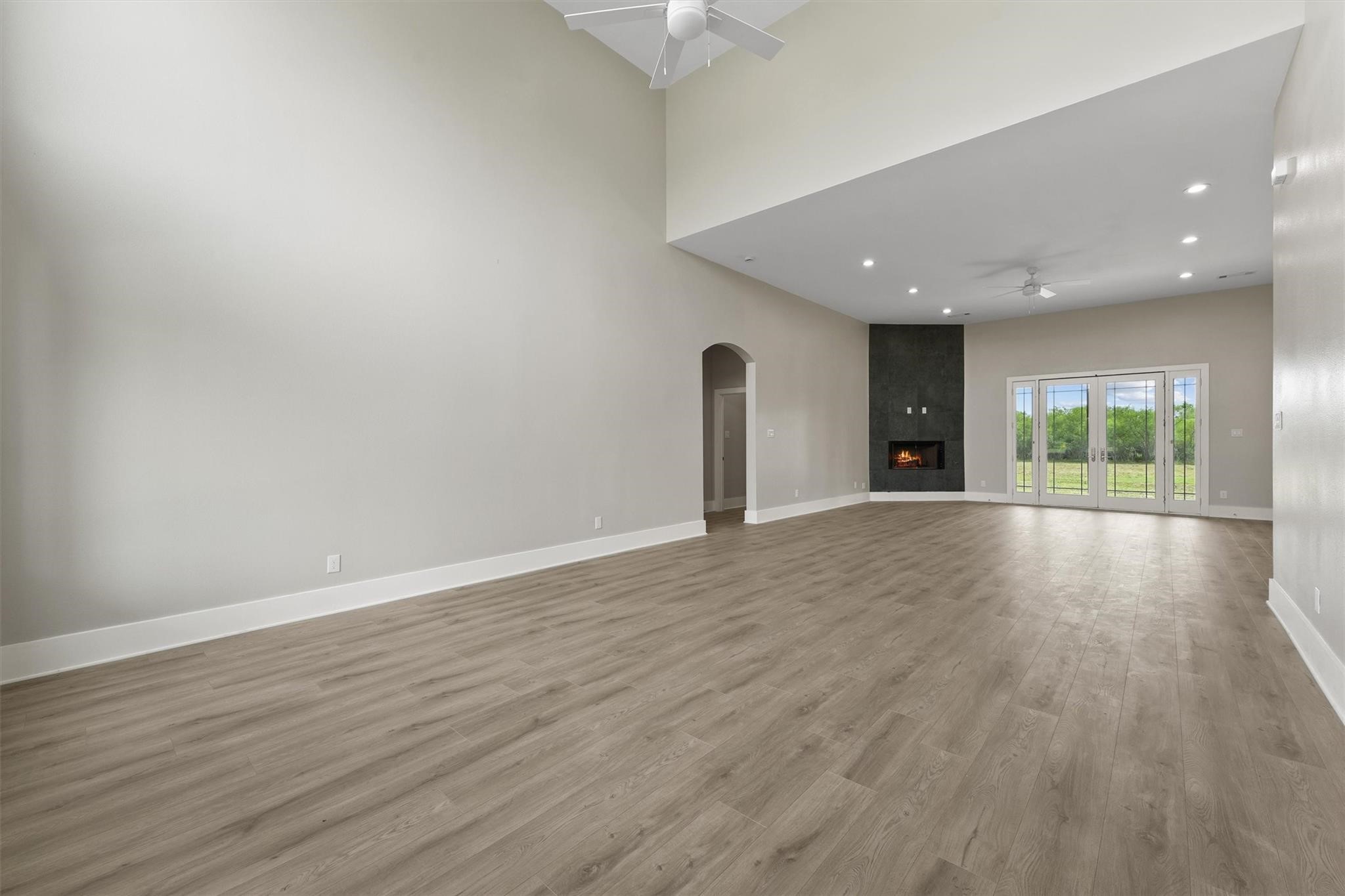 1900 Lezak Road Sealy, TX 77474 - Photo 6 of 34 wooden floor in an empty room with a window