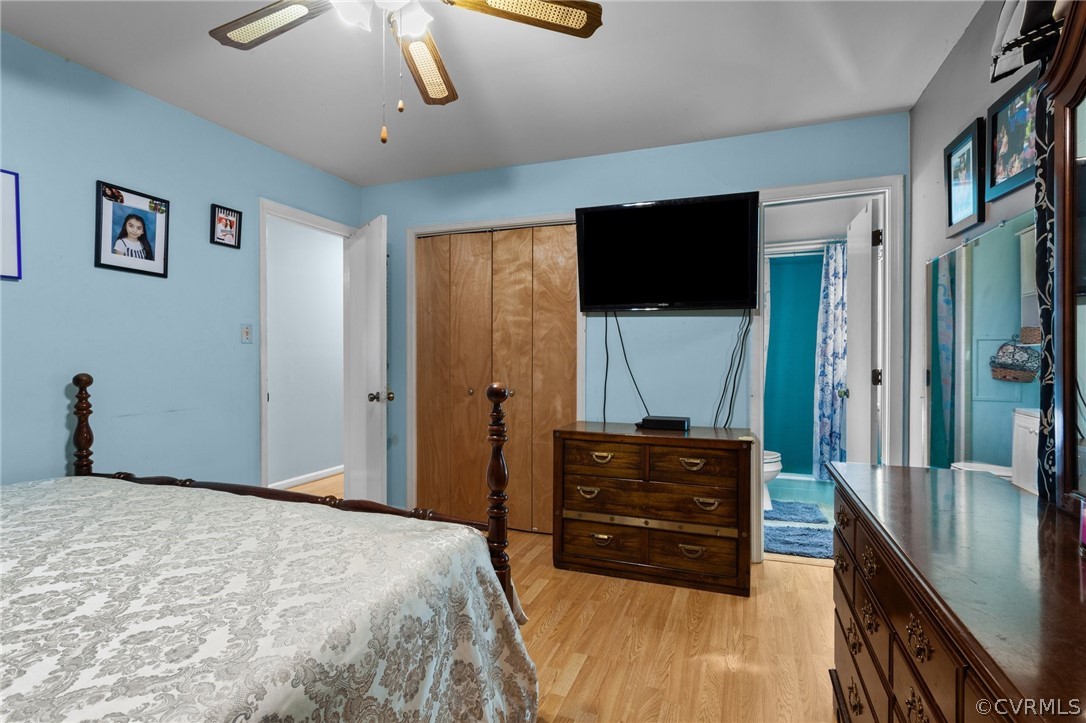 14812 Nash Road Chesterfield, VA 23838 - Photo 23 of 26 a bedroom with a bed and a flat screen tv