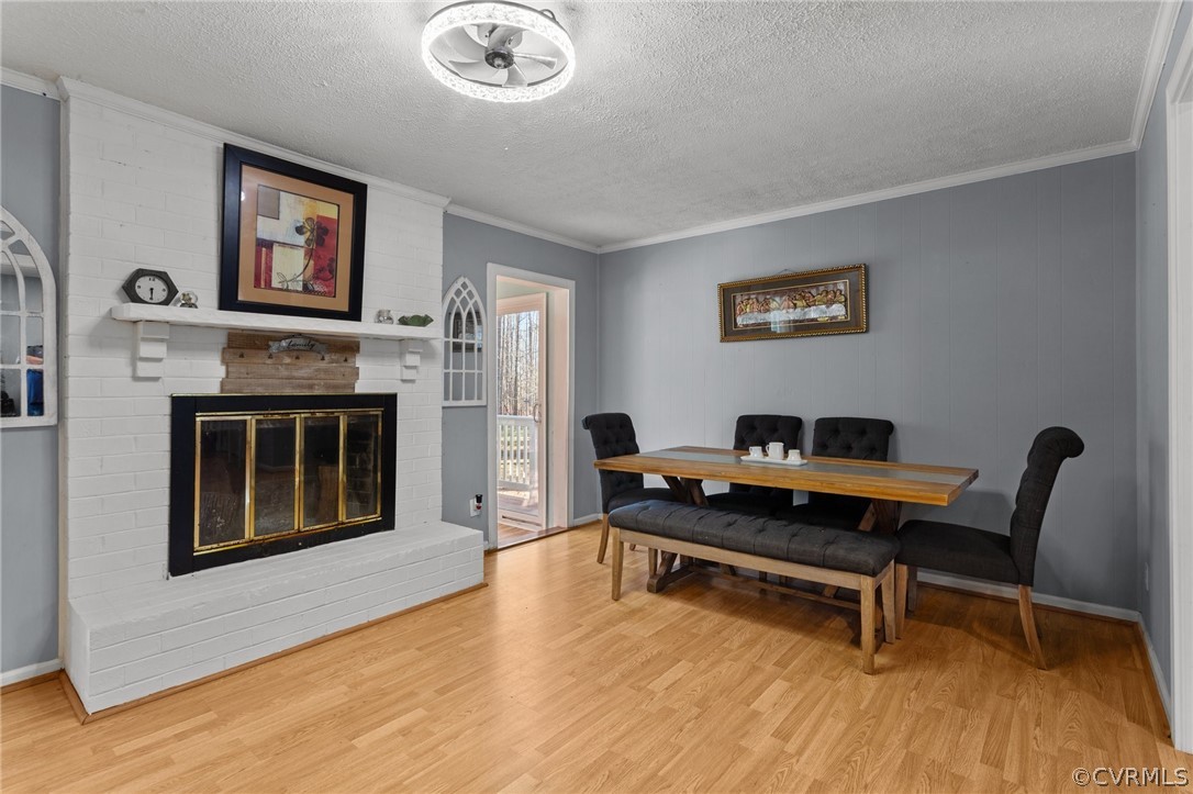 14812 Nash Road Chesterfield, VA 23838 - Photo 7 of 26 a reading room with furniture and a wooden floor