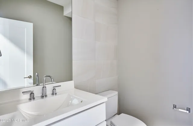 a bathroom with a sink and a toilet