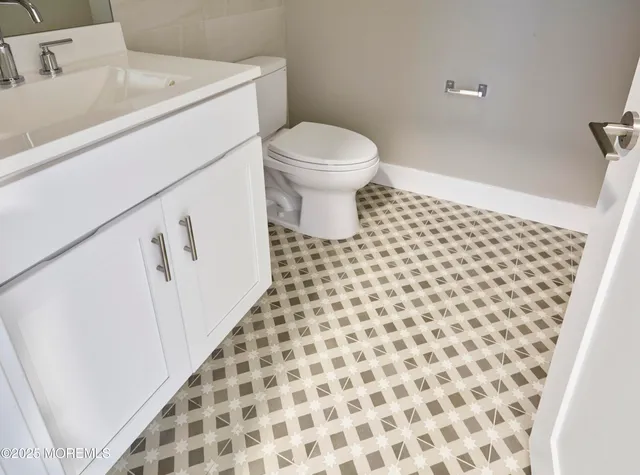 a bathroom with a sink and a toilet