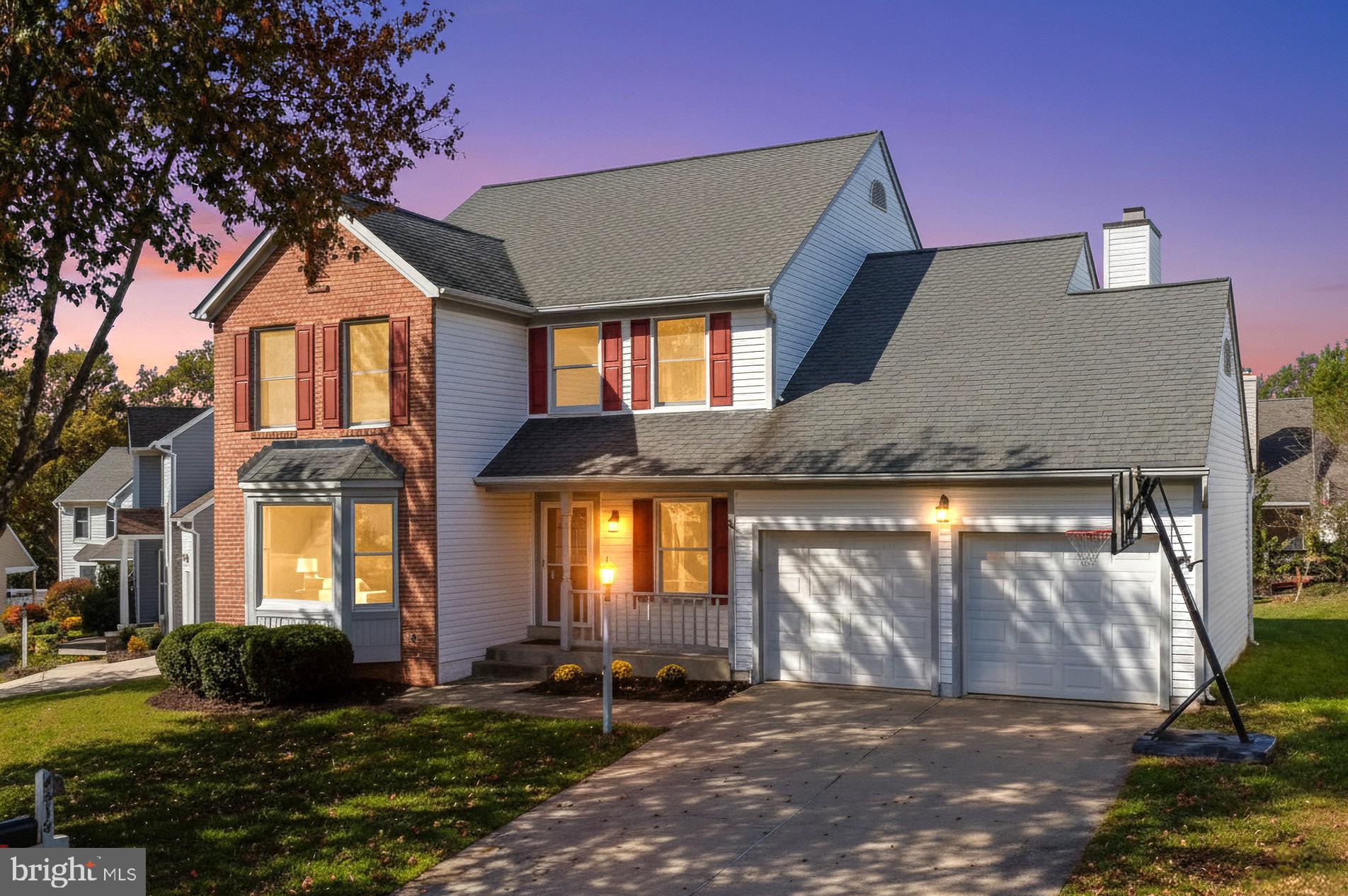 4518 Haywagon Way Ellicott City, MD 21043 - Photo 1 of 54 a front view of a house with a yard