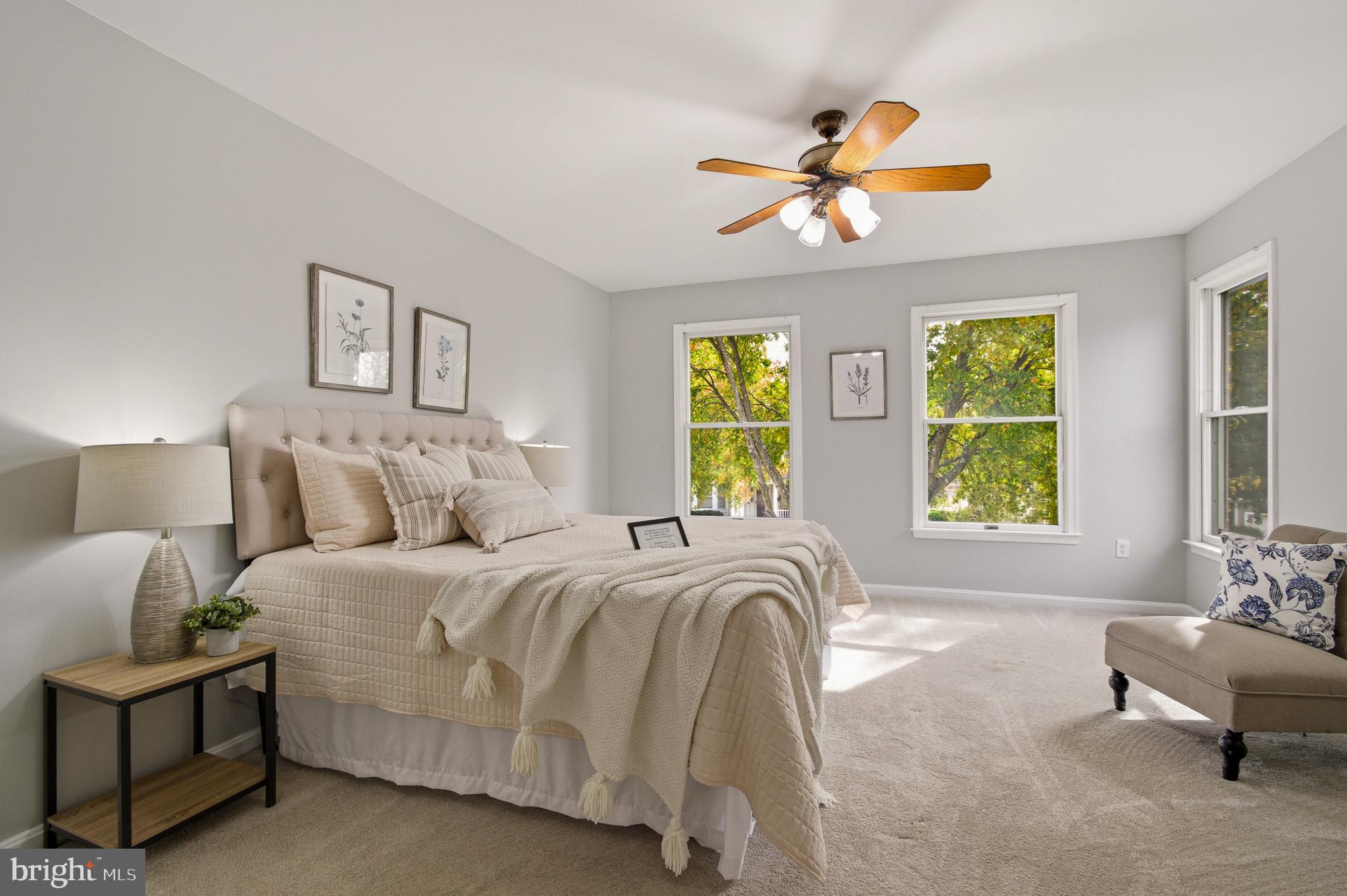 4518 Haywagon Way Ellicott City, MD 21043 - Photo 25 of 54 a spacious bedroom with a bed and a window