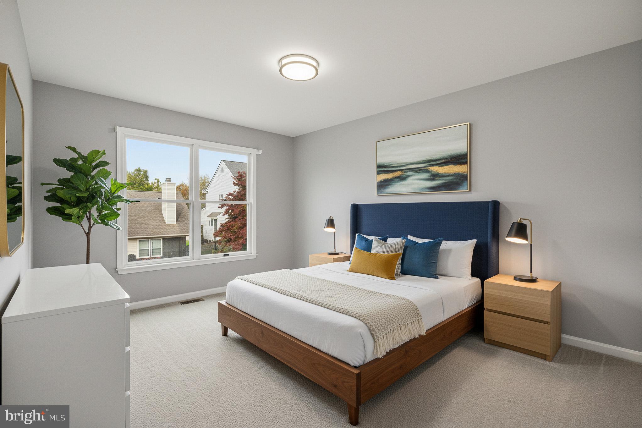 4518 Haywagon Way Ellicott City, MD 21043 - Photo 34 of 54 a bedroom with a bed and a potted plant