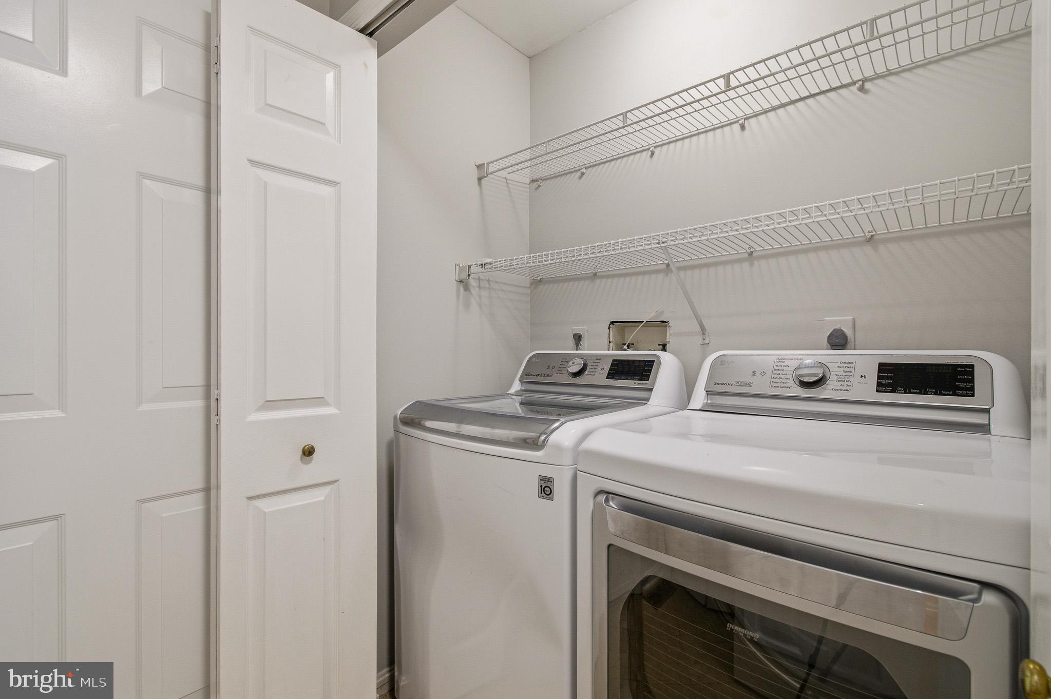 4518 Haywagon Way Ellicott City, MD 21043 - Photo 39 of 54 a utility room with dryer and washer