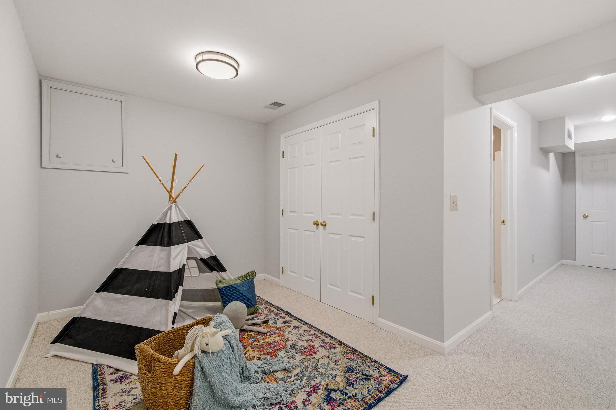 4518 Haywagon Way Ellicott City, MD 21043 - Photo 43 of 54 a bedroom with a bed and a window