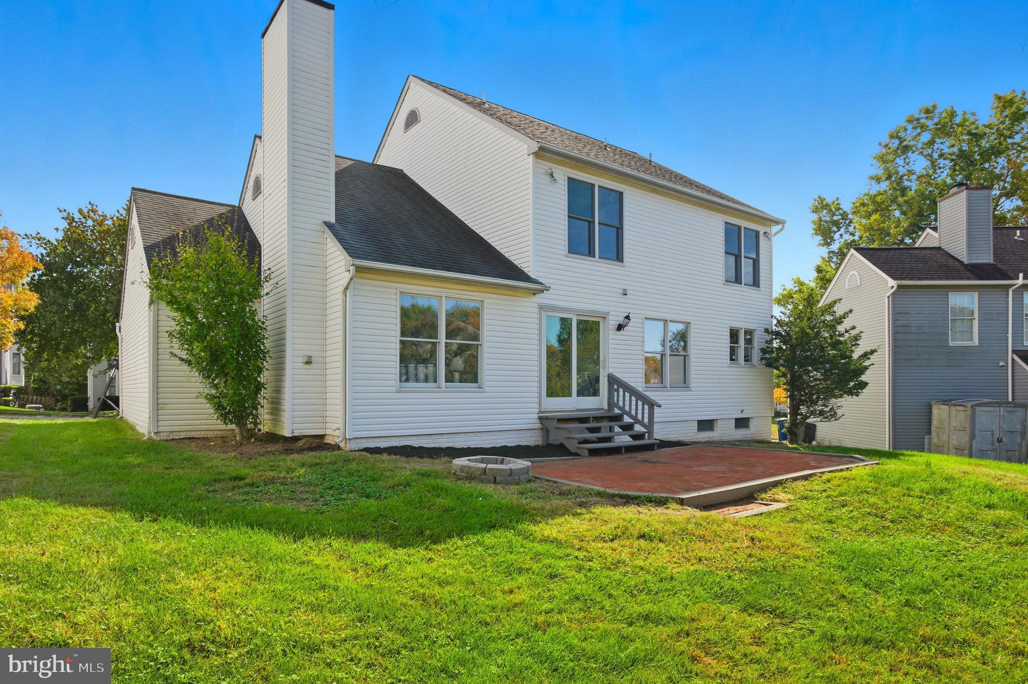 4518 Haywagon Way Ellicott City, MD 21043 - Photo 46 of 54 a view of a house with backyard and sitting area
