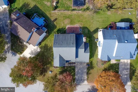 a view of a street with lots of trees