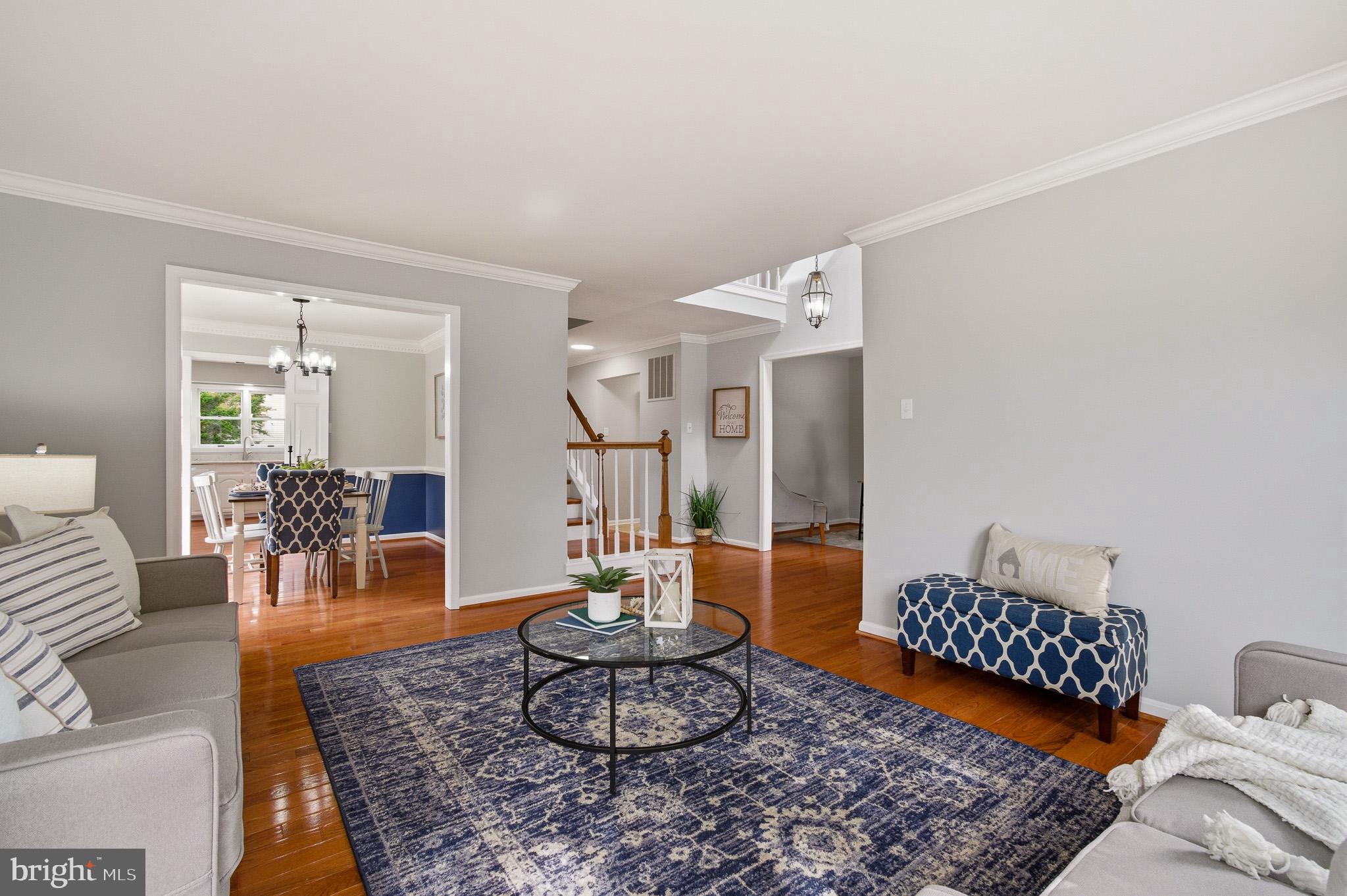 4518 Haywagon Way Ellicott City, MD 21043 - Photo 5 of 54 a living room with furniture rug and a table