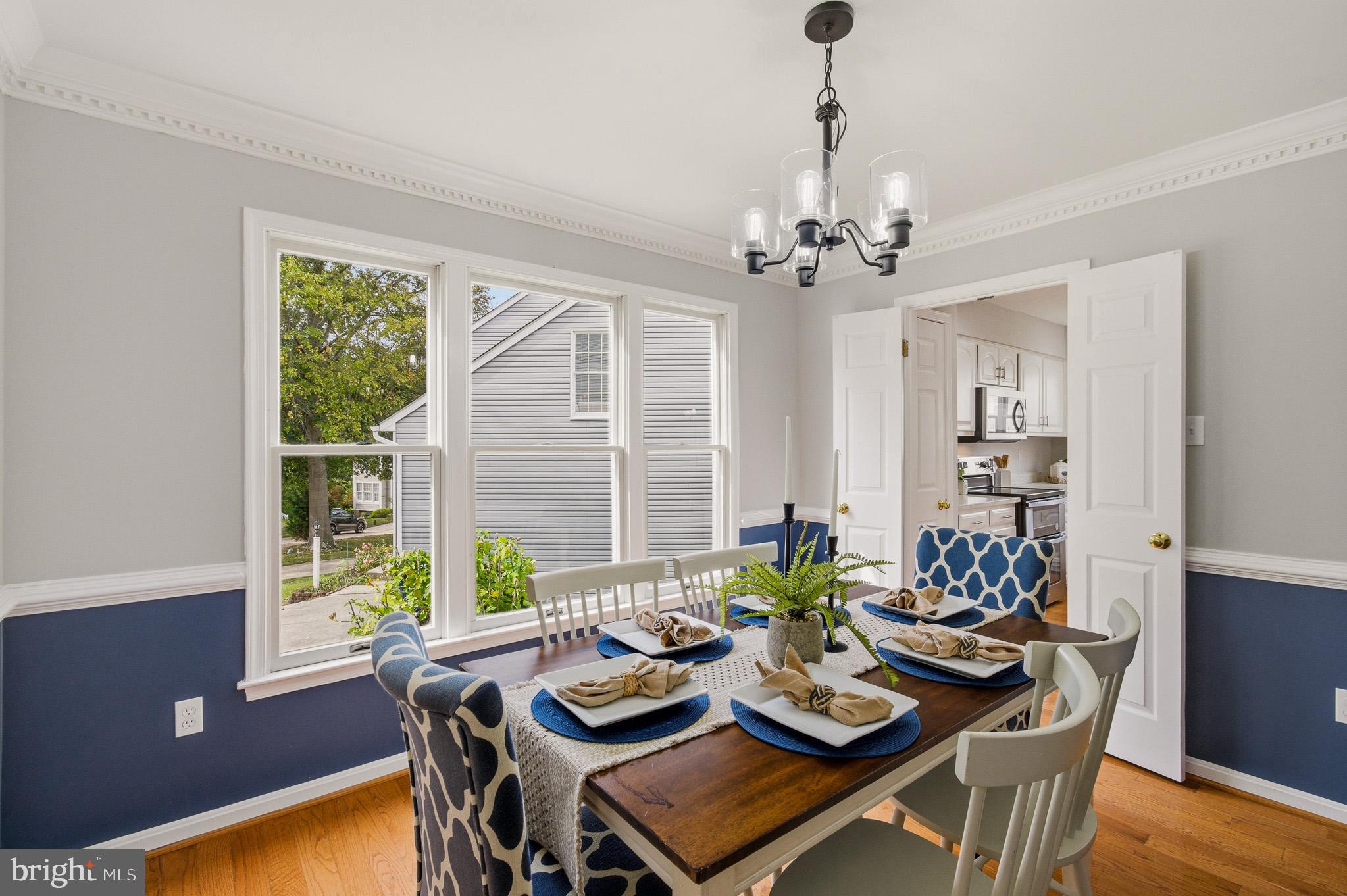 4518 Haywagon Way Ellicott City, MD 21043 - Photo 10 of 54 a view of a dining room with furniture window and outside view