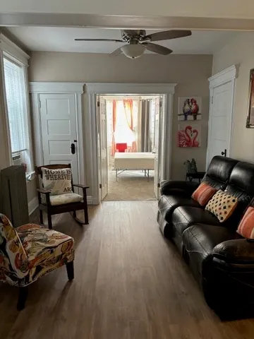 a living room with furniture and a window