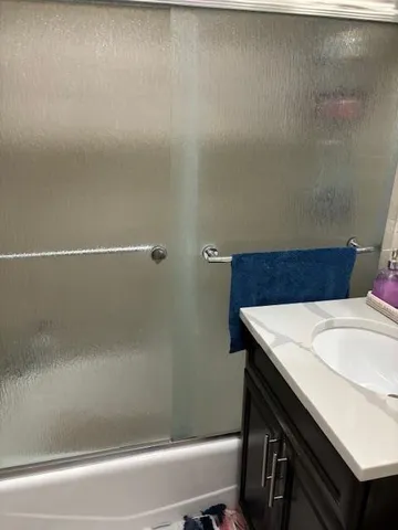 a bathroom with a sink and a vanity