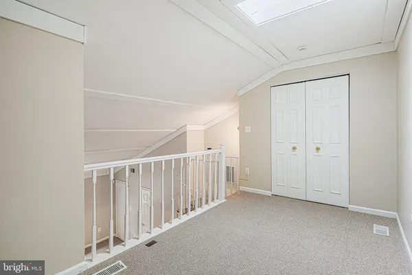 a view of balcony with furniture