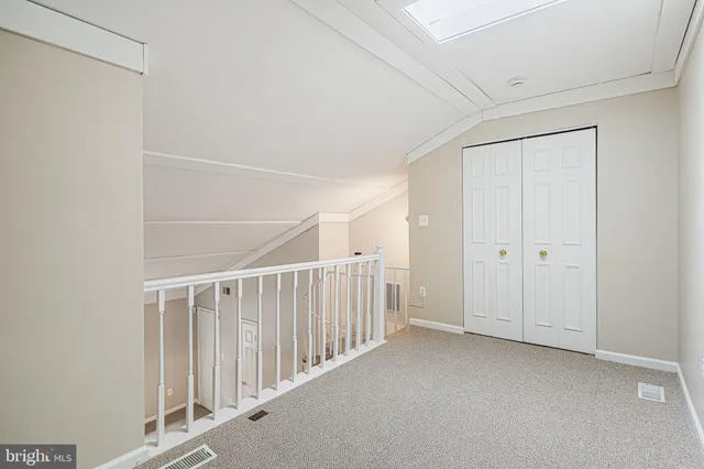 a view of balcony with furniture