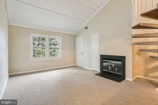 a view of a livingroom with a fireplace