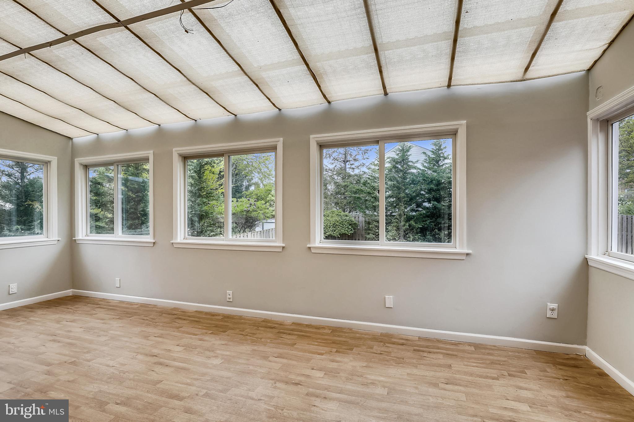 9828 Belhaven Road Bethesda, MD 20817 - Photo 6 of 18 Sun room off kitchen