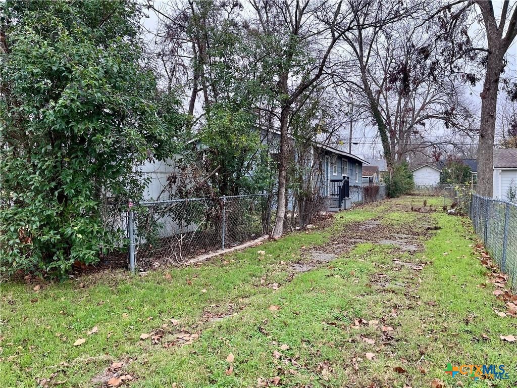 1201 South 21st Street Temple, TX 76504 - Photo 15 of 15 a backyard of a house with lots of green space