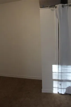 a view of a closet in the kitchen