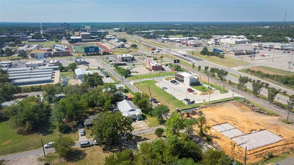 an aerial view of residential building and parking space