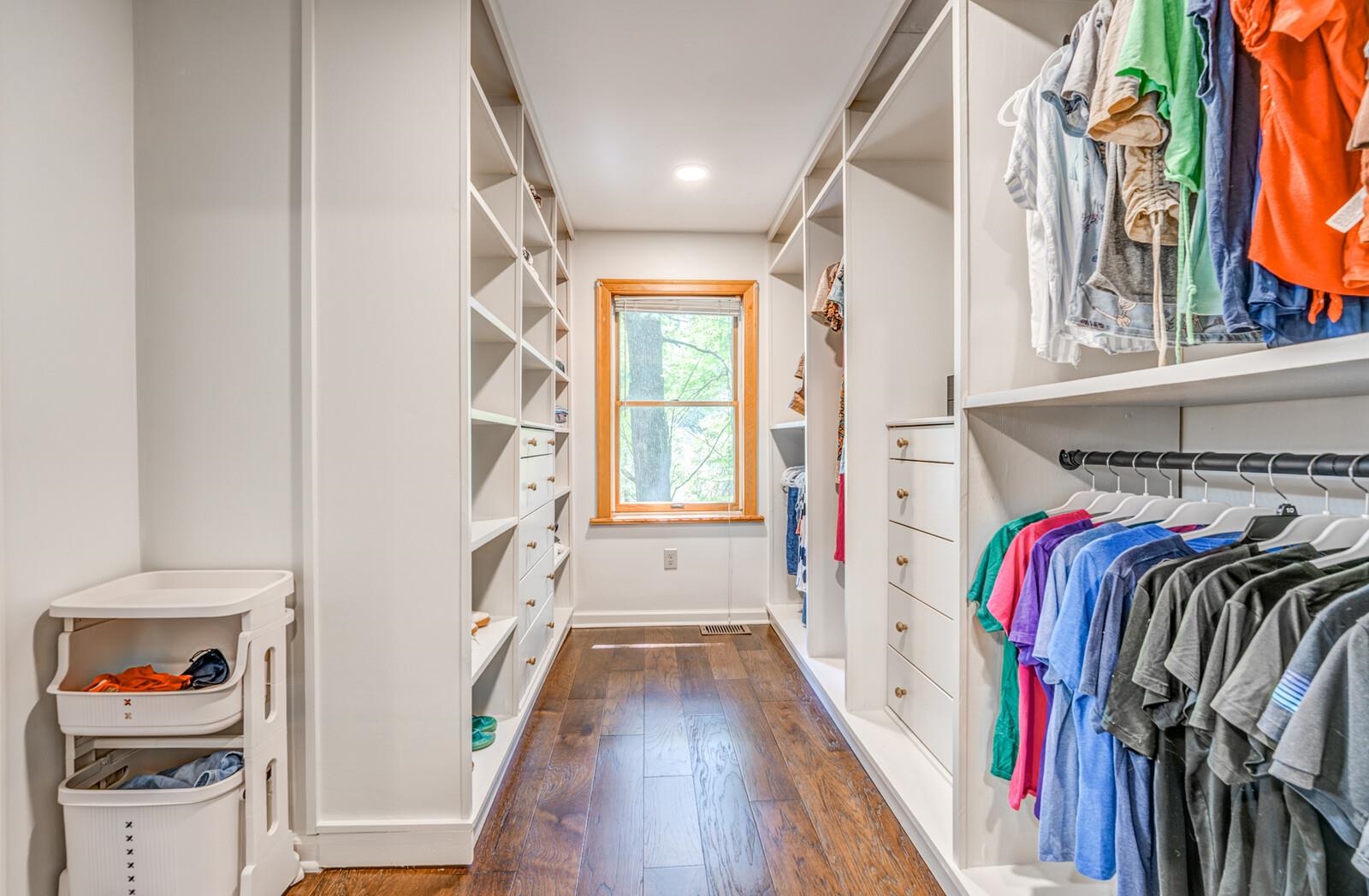 8651 Baylor Road Bartlett, TN 38002 - Photo 9 of 29 a view of walk in closet with clothes and shoes