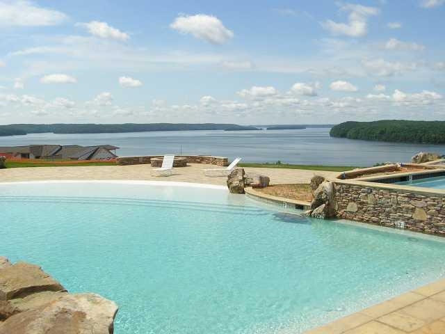 106 Gentle Ridge Way Savannah, TN 38372 - Photo 3 of 9 a view of a lake with outdoor space