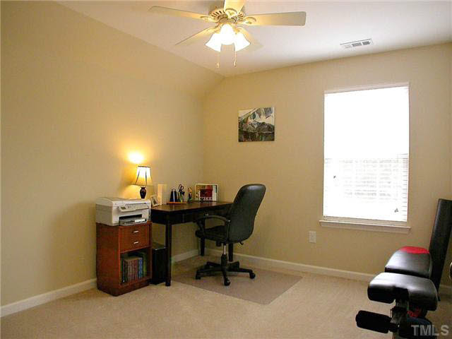 21 Kissimee Court Durham, NC 27713 - Photo 17 of 25 a view of a workspace with furniture and a window