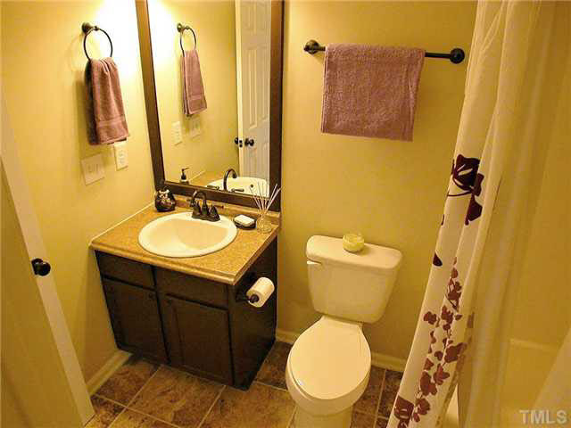21 Kissimee Court Durham, NC 27713 - Photo 20 of 25 a bathroom with a sink and a toilet