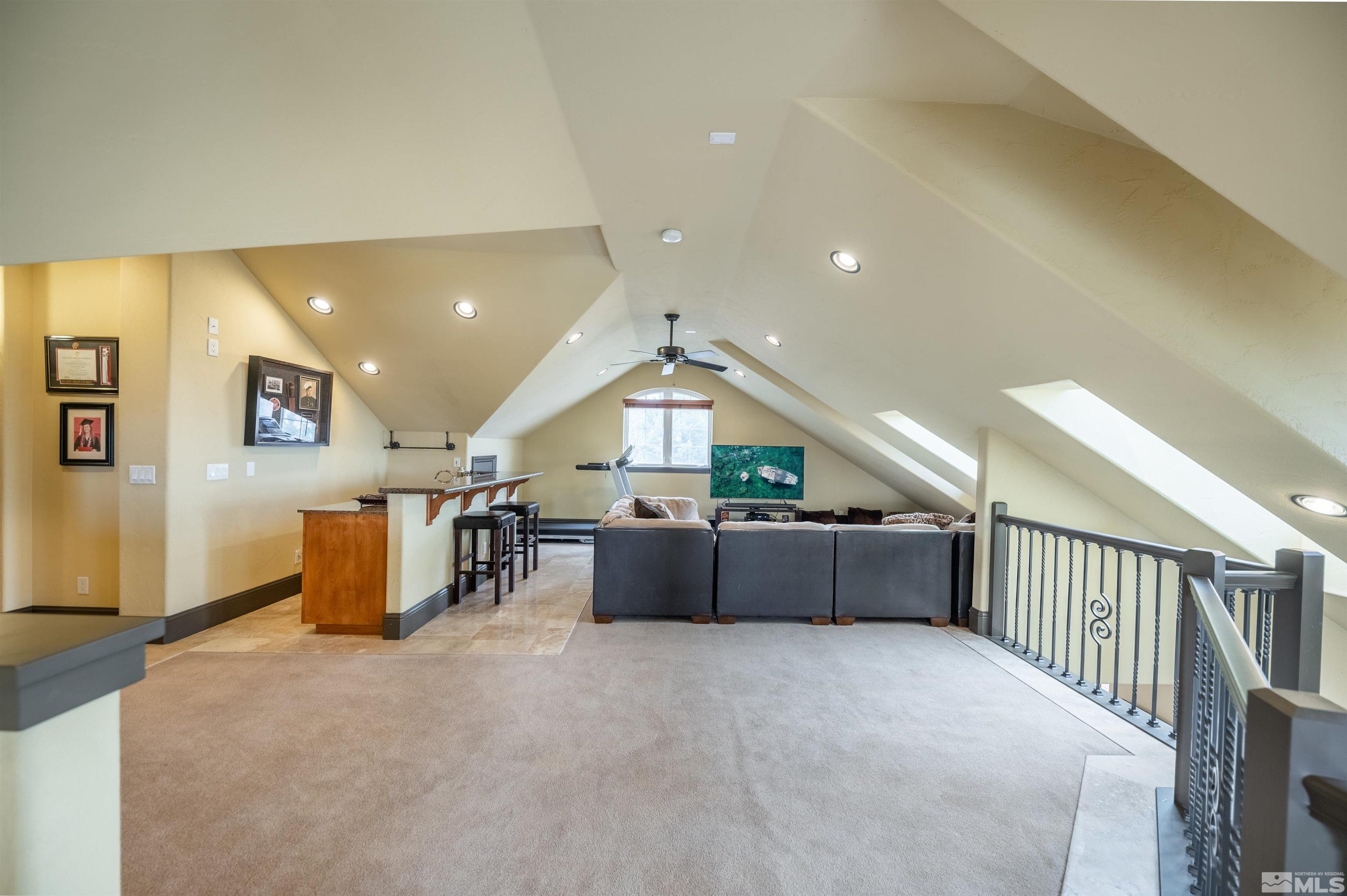 4271 Dant Boulevard Reno, NV 89509 - Photo 15 of 24 a large room with a large window and furniture