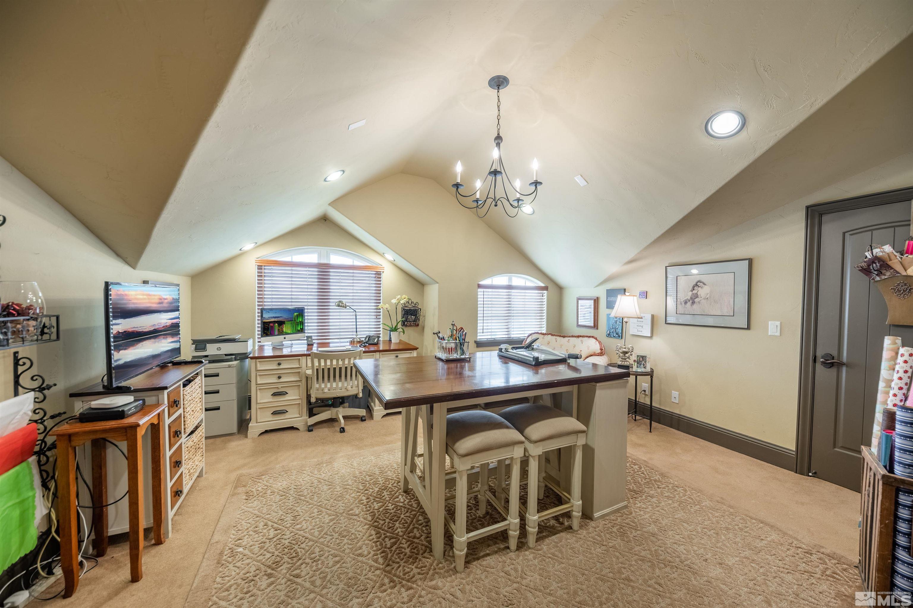 4271 Dant Boulevard Reno, NV 89509 - Photo 16 of 24 a view of a dining room with furniture window and wooden floor