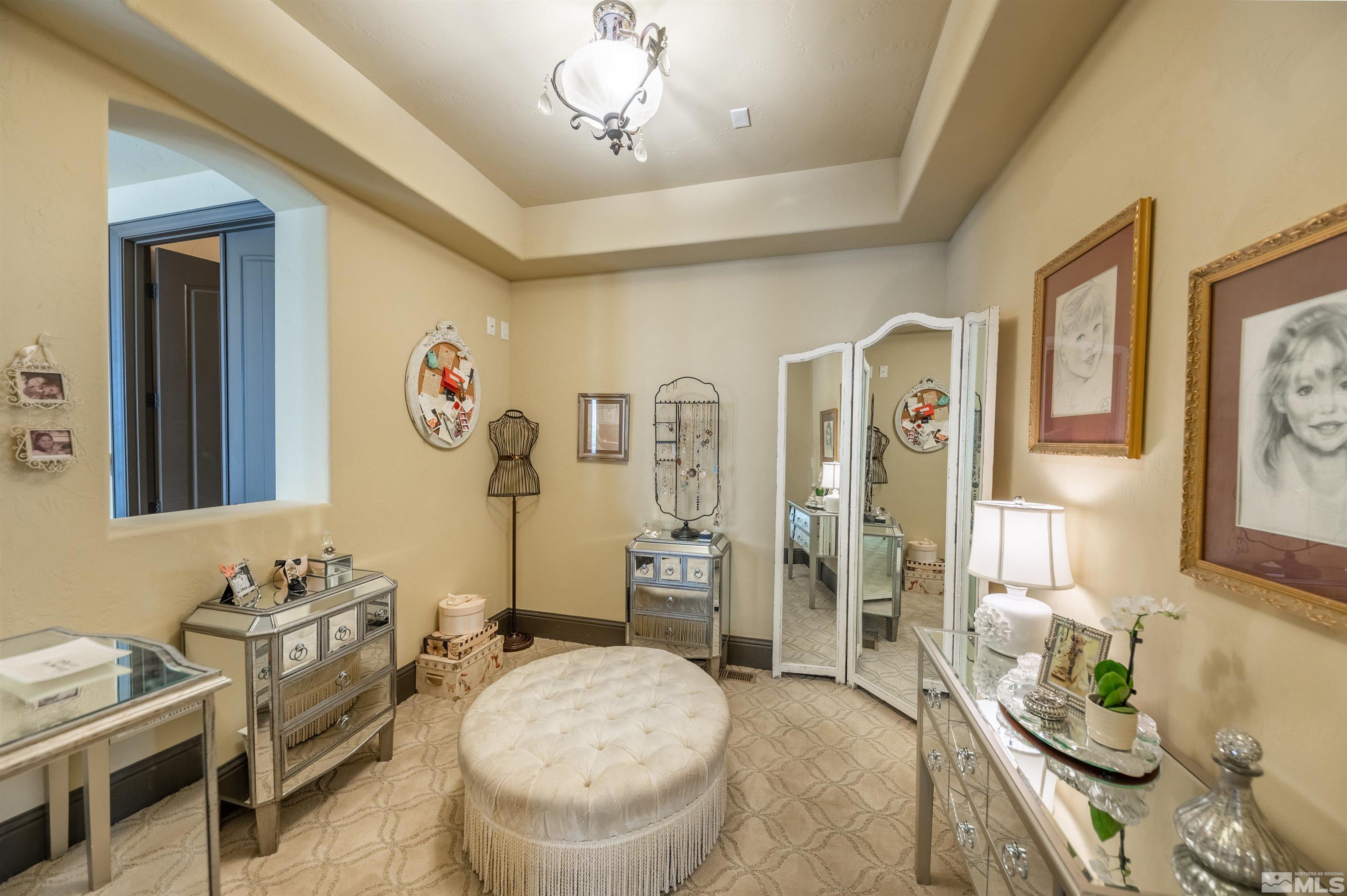 4271 Dant Boulevard Reno, NV 89509 - Photo 9 of 24 a spacious bathroom with a granite countertop sink and a mirror