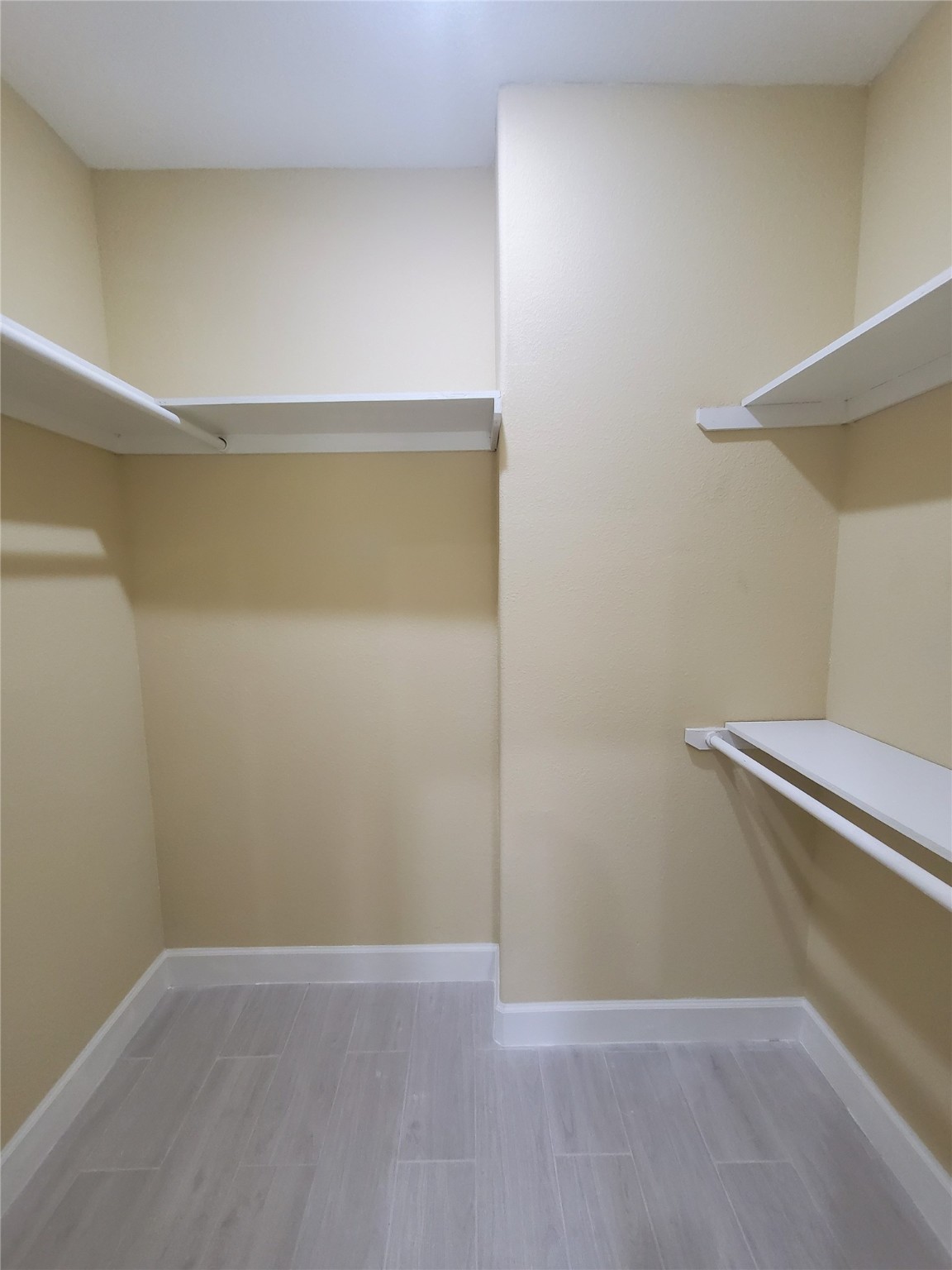 1306 North 9th Street Conroe, TX 77301 - Photo 17 of 47 Unit A Walk in Closet in upstairs bedroom
