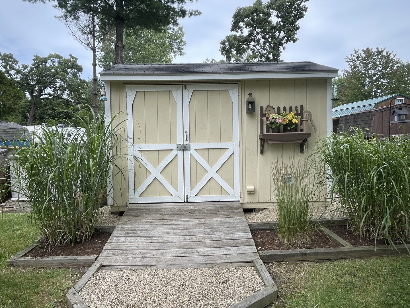 5-50 Woodhaven Lakes Sublette, IL 61367 - Photo 21 of 21 a front view of a house with garden