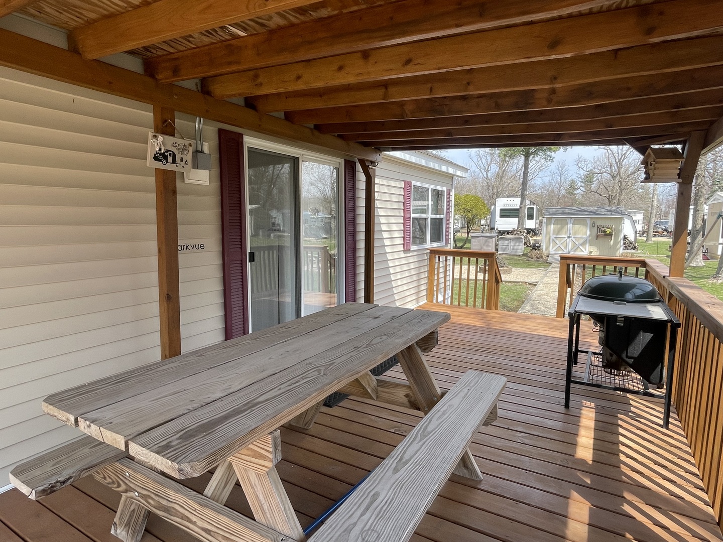 5-50 Woodhaven Lakes Sublette, IL 61367 - Photo 4 of 21 a view of a patio with wooden floor