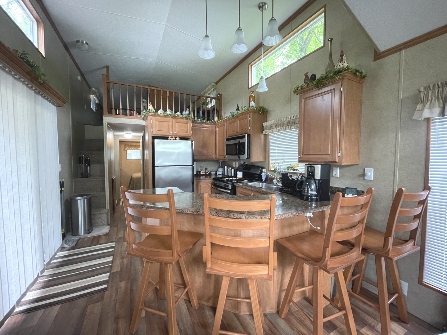 5-50 Woodhaven Lakes Sublette, IL 61367 - Photo 6 of 21 a dining room with furniture and a chandelier