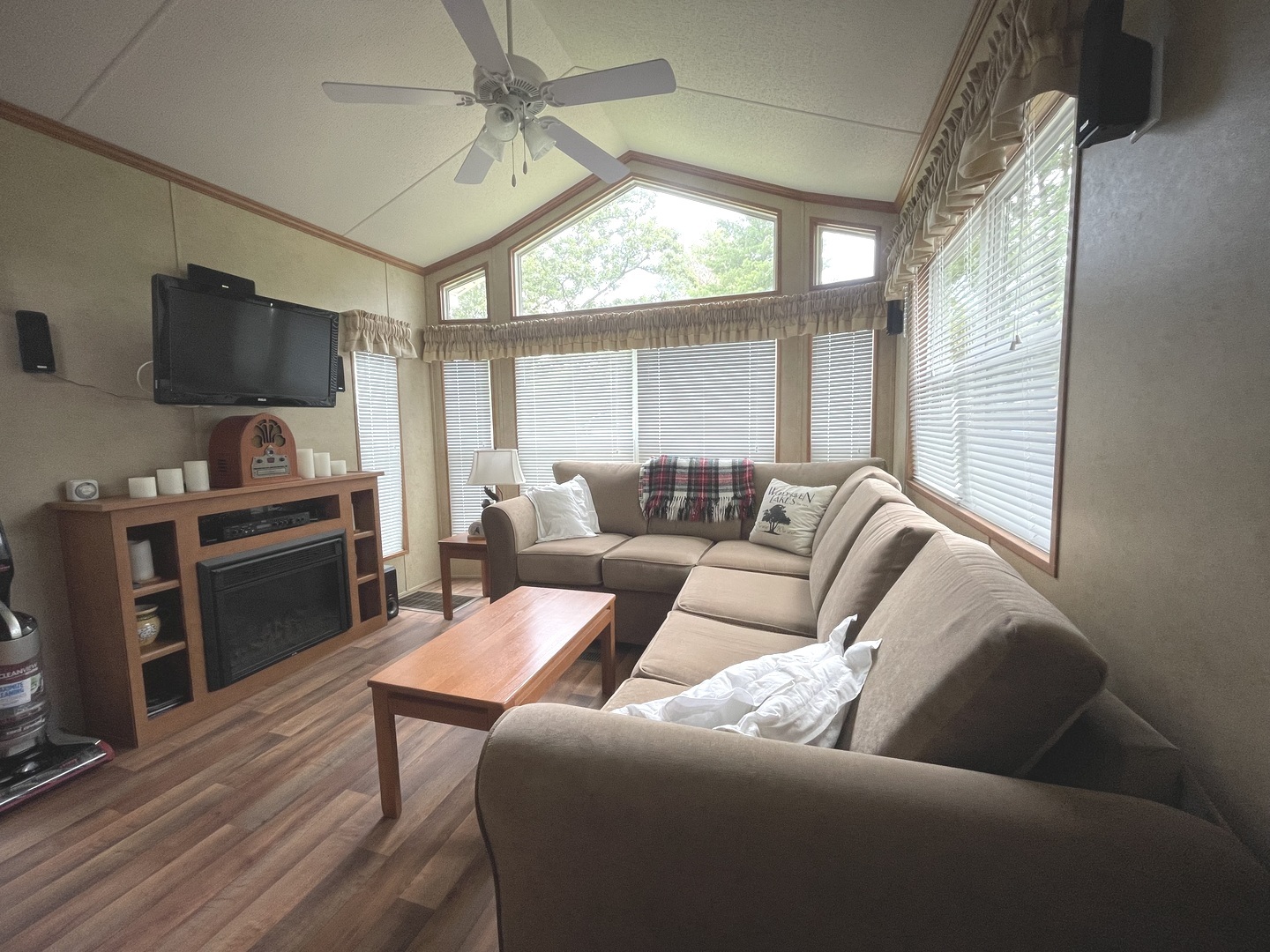 5-50 Woodhaven Lakes Sublette, IL 61367 - Photo 10 of 21 a living room with furniture and a flat screen tv