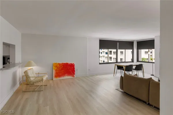 a living room with furniture and window