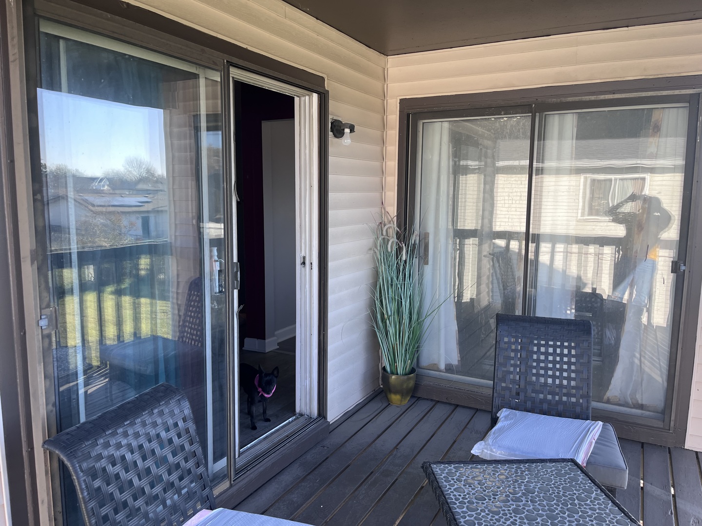 56 Timberlane Road Matteson, IL 60443 - Photo 30 of 40 a view of a balcony with a potted plant and wooden floor
