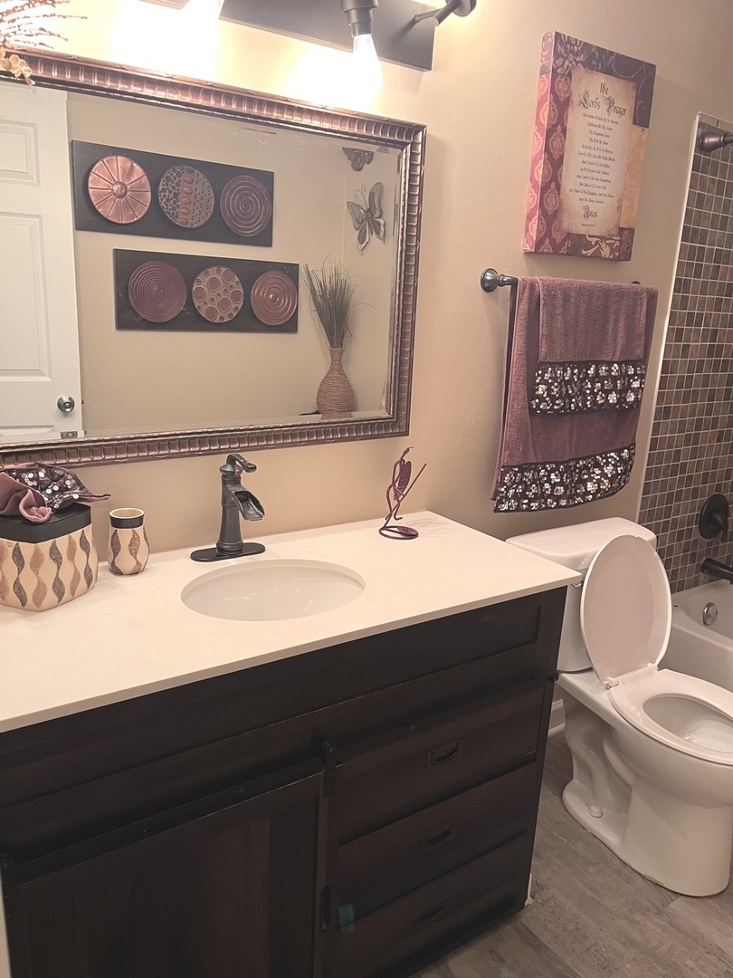 56 Timberlane Road Matteson, IL 60443 - Photo 37 of 40 a bathroom with a sink mirror vanity and toilet